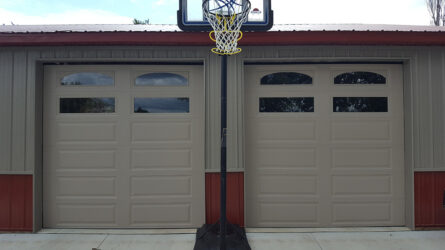 Photo of two tan garage doors